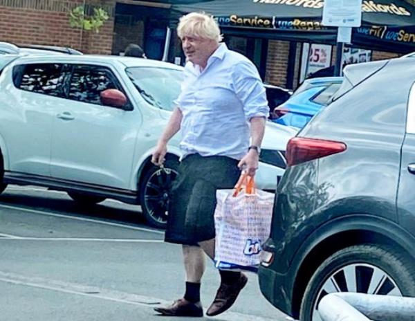 Boris Johnson at budget chain B&M in Didcot, Oxfordshire. May 18, 2024. Photo released - May 19, 2024. Boris Johnson has been spotted shopping - at budget chain B&M. The former PM was seen at the home store which sells ?big brands at sensatio<em></em>nal prices?. Boris was spotted in the Didcot, Oxfordshire, B&M Home Store and Garden Centre at around midday on Saturday. The ex-PM was spotted indulging in some retail therapy wearing a white shirt with the top buttons undone and sleeves rolled up, with a B&M carrier bag in hand. The shopper who snapped the pics says Boris drove off in a green Toyota Previa people carrier. He could also be seen paying for his shopping at the tills.