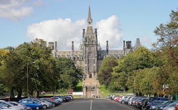 tudents in front of the large facade of Fettes College