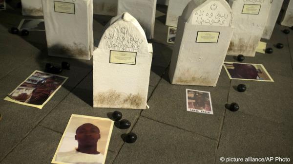 From file: Photographs of some of those who died in Tarajal, placed by activists at a remembrance march in 2017 | Photo: Francisco Seco / AP Photo / picture alliance