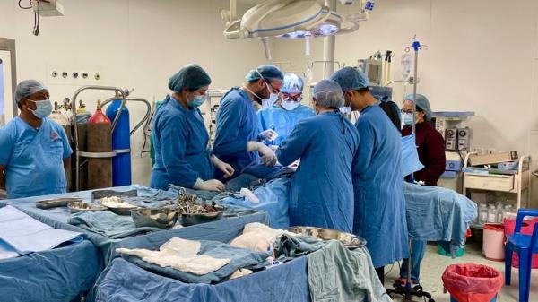 Doctors work on a patient