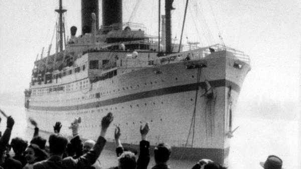 The British troop ship Empire Windrush is pictured arriving at Southampton, England, from the Middle East, April 1953. (AP Photo)