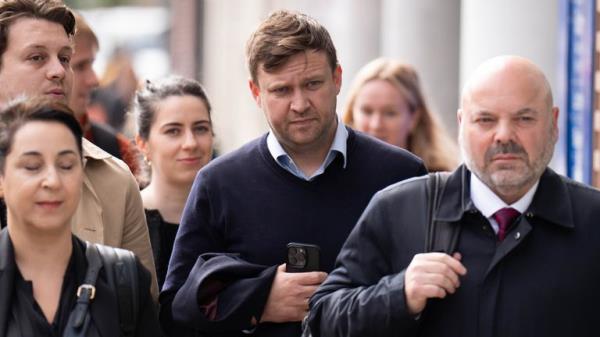 Scott Law, 43 (centre) arrives at Highbury Corner Magistrates' Court, north London, wher<em></em>e he is accused of headbutting football pundit and former Manchester United midfielder Roy Keane, at the Emirates Stadium on September 3 last year. Picture date: Wednesday May 29, 2024. The charge relates to an incident at Emirates Stadium on September 3 last year, following Arsenal's 3-1 victory over Manchester United, wher<em></em>e Keane was working as a pundit. Footage was posted on social media of fellow Sky Spor