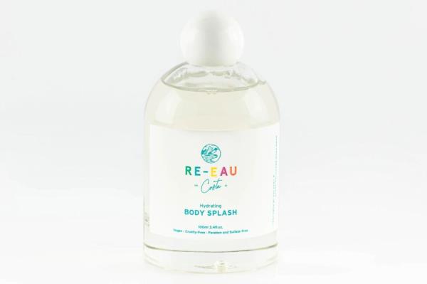 A bottle of liquid with a white label