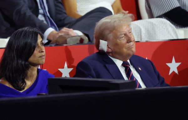 Usha Chilukuri Vance and her husband J.D. Vance, share a kiss on stage at the Republican Natio<em></em>nal Co<em></em>nvention in Milwaukee.