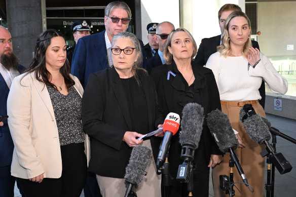 Co<em></em>nstables Rachel McCrow’s and Matthew Arnold’s families (left to right) Samantha McCrow,Terry Arnold, Judy McCrow, Sue Arnold, James Arnold and Hayley Arnold speak outside the Brisbane Coro<em></em>ners Court.