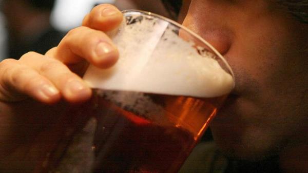 File photo dated 01/12/06 of a man drinking a pint of beer, as almost a third of pub visits are now completely alcohol-free as the trend for moderation among drinkers co<em></em>ntinues to grow, according to new research.