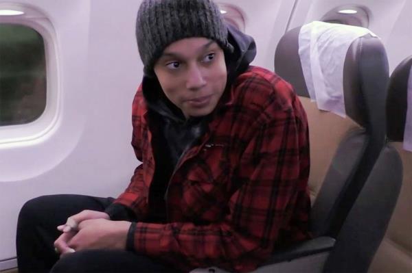 Brittney Griner is seen on a plane ahead of departing for the United States.