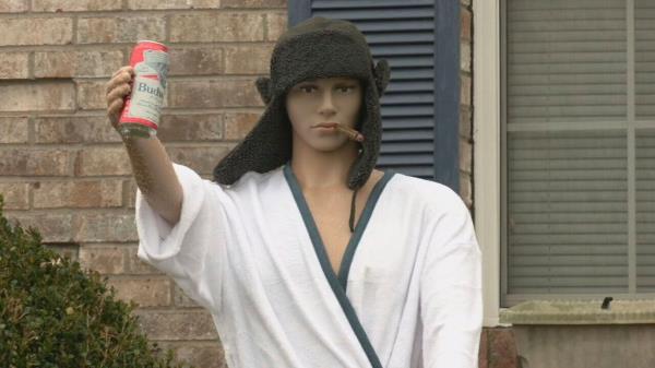 The mannequin is decorated to look like 