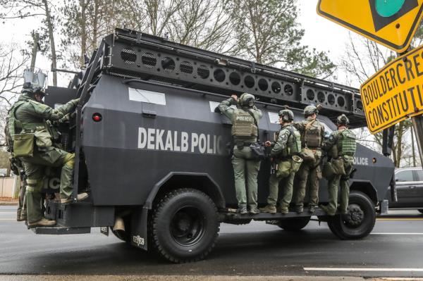 The shooting took place while police were clearing people away from the site of a planned public safety training center.
