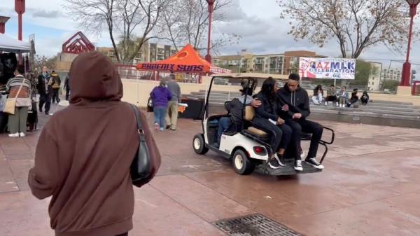 The hoops star keeps a protective arm around her spouse