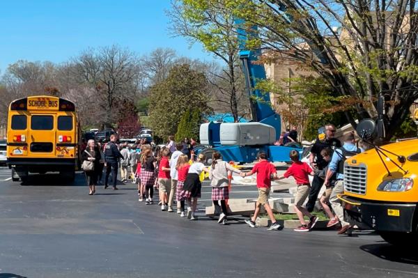Children from The Covenant School getting evacuated from the building after the shooting.