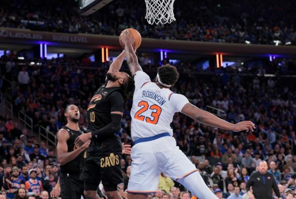 Mitchell Robinson blocks Darius Garland's shot during the Knicks' Game 3 win.