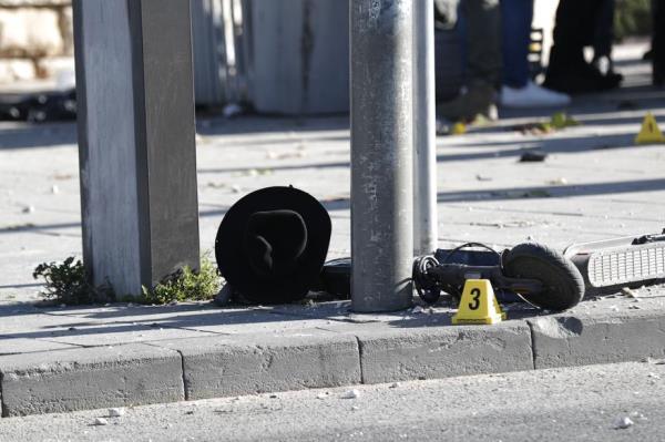Belo<em></em>ngings of victims lie at the site of explosion at a bus stop near entrance to Jerusalem.