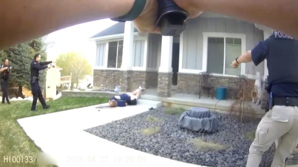 Police approach Jeffrey's body.