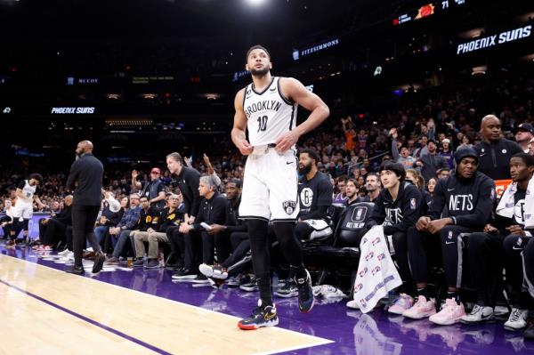 Ben Simmons #10 of the Brooklyn Nets walks off the bench after being ejected