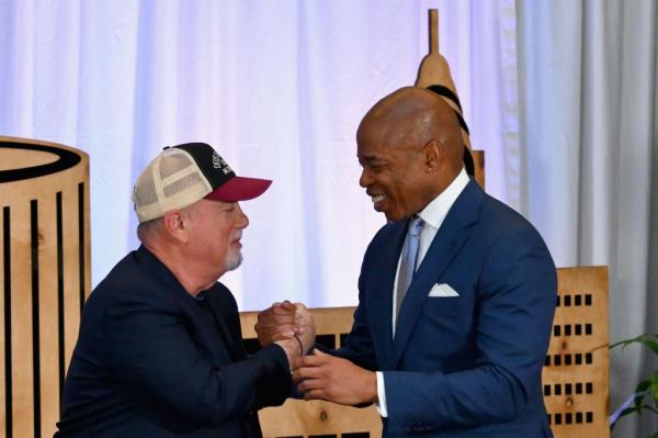 Billy Joel and New York City Mayor Eric Adams.