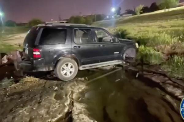 The SUV hit a ditch. 