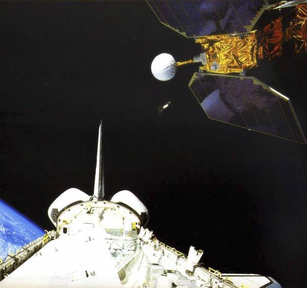 In this photo made available by NASA, the space shuttle Challenger launches the Earth Radiation Budget Satellite in 1984. On Friday, Jan. 6, 2023, the U.S. space agency said the 38-year-old NASA satellite is a<em></em>bout to fall from the sky, but the chance of wreckage falling on anybody is “very low.” It's expected to come down Sunday night, give or take 17 hours.
