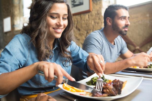 Couple havin<em></em>g lunch at rustic gourmet restaurant