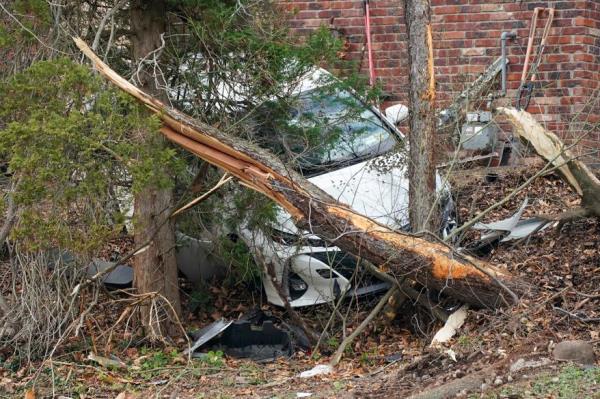 The bus struck two cars before hitting a house.