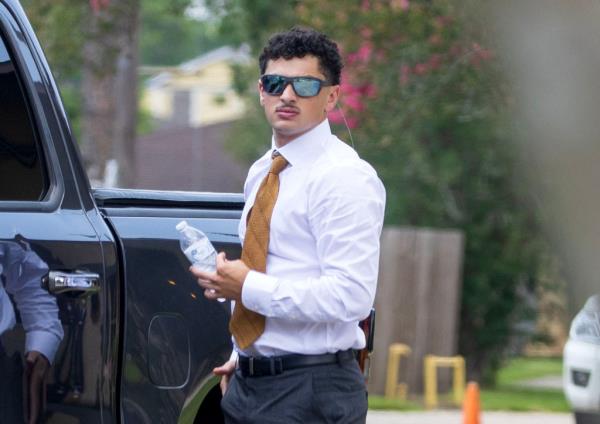 Robbin's parents and siblings were also photographed walking towards the church