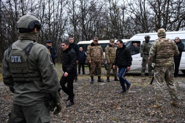 Armenian priso<em></em>ners of war (POWs) are seen during a swap at the Azerbaijani-Armenian state border