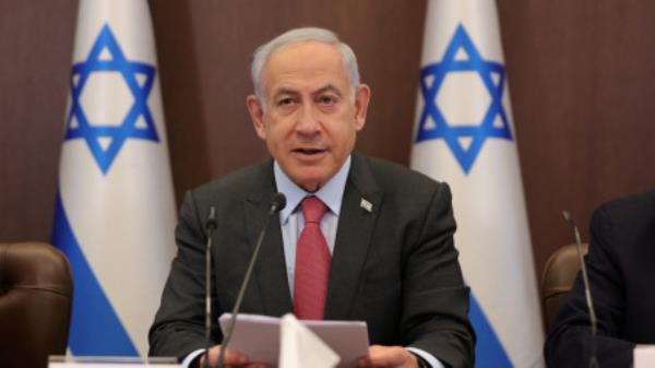 Israeli Prime Minister Benjamin Netanyahu attends the weekly cabinet meeting in the prime minister's office in Jerusalem, March 19, 2023. Abir Sultan/Pool via REUTERS</p>

<p>　　