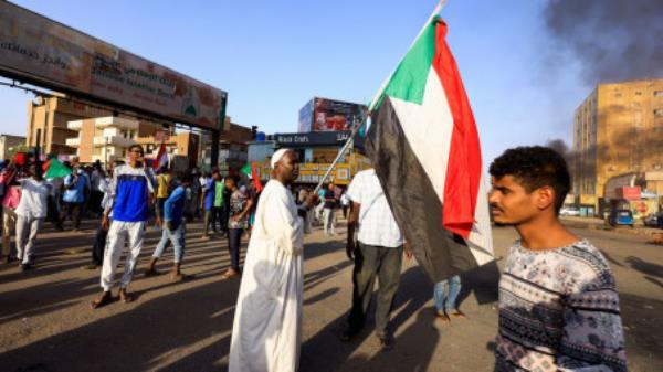 Protesters take part in a rally against military rule following a coup to commiserate the anniversary of a sit-in that culminated with Bashir's overthrow in Khartoum North, Sudan April 6, 2022. REUTERS/Mohamed Nureldin Abdallah