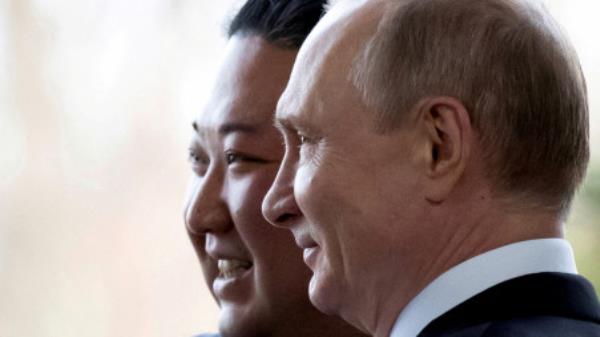 FILE PHOTO: FILE PHOTO: Russian President Vladimir Putin and North Korea's leader Kim Jong Un pose for a photo during their meeting in Vladivostok, Russia, April 25, 2019. Alexander Zemlianichenko/Pool via REUTERS//File Photo