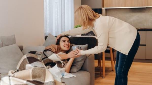 Mom Taking Care of Daughter