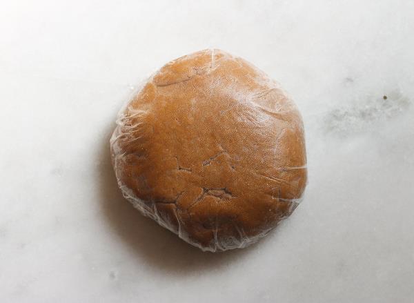 chilled gingerbread coo<em></em>kie dough wrapped in plastic
