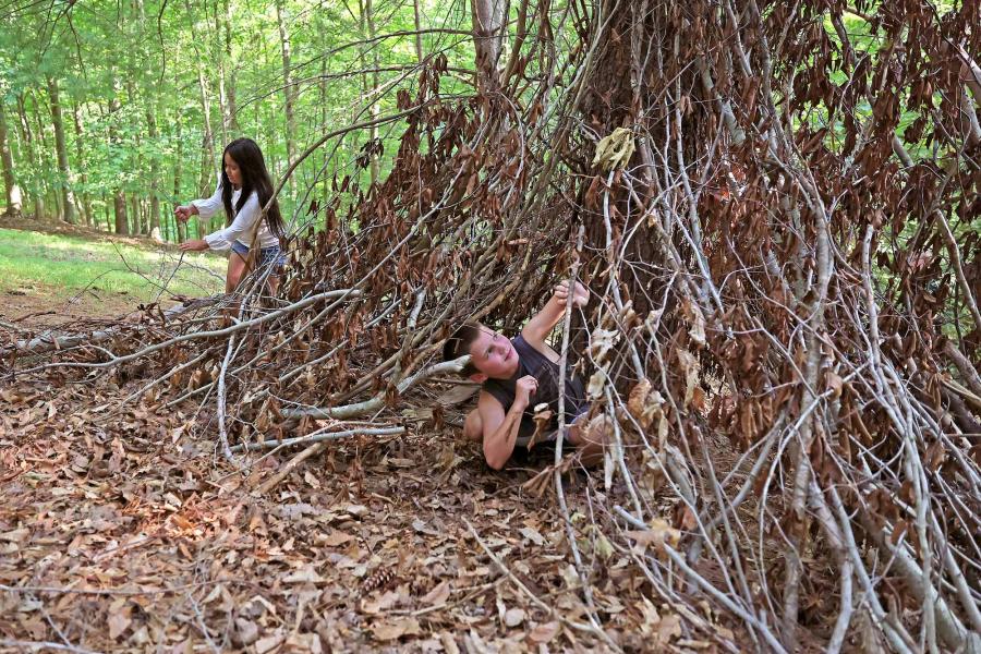 Portrait of Children Playing in the Woods