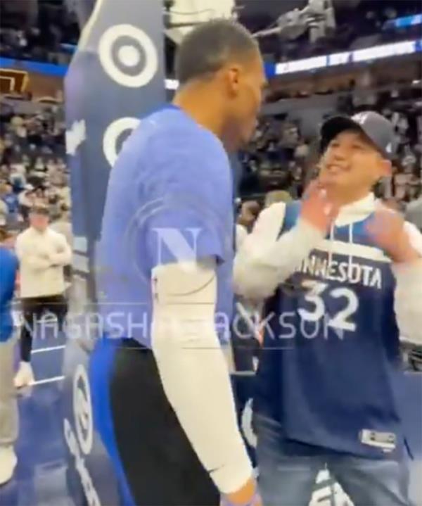 Clippers star Russell Westbrook co<em></em>nfronts a Timberwolves fan before a game at Target center in Minneapolis on January 14, 2024.  