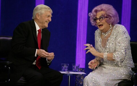 Sir Michael with guest Dame Edna Everage in 2004