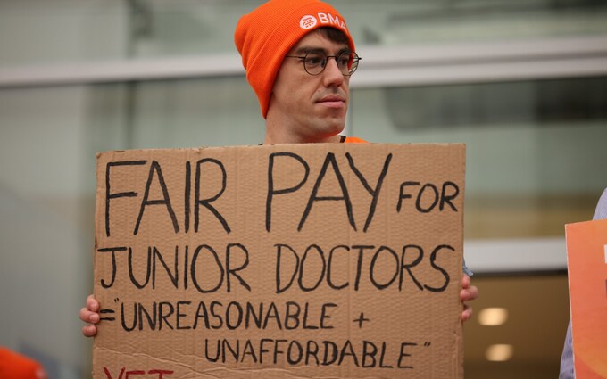 Staff hold placards on a picket line outside University College Hospital in central Lo<em></em>ndon during a dispute over pay