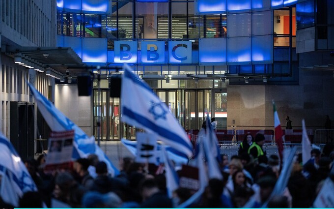 People gather outside BBC Headquarters to protest the corporations refusal to label Hamas 'terrorists'; October 16 2023
