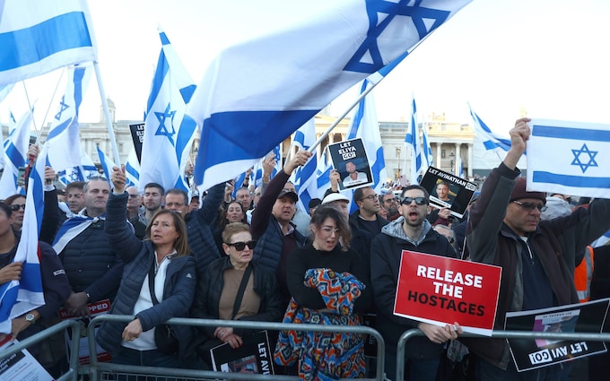 People at a 'Bring Them Home' solidarity rally in Trafalgar Square, calling for the release of hostages held in Gaza by Hamas