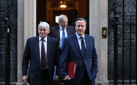 Andrew Mitchell and David Cameron leave Downing Street after Cabinet meeting