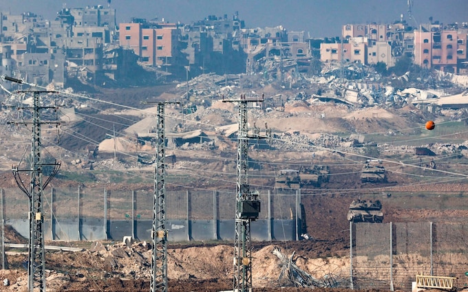 IDF armoured vehicles and tanks return to Israel from northern Gaza