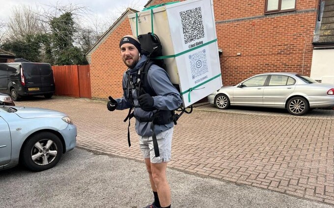 Daniel Fairbrother with the fridge 