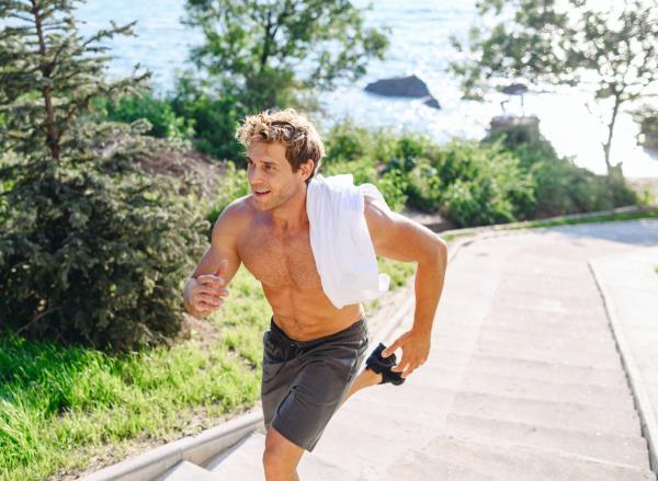 man running outdoors, co<em></em>ncept of daily workout to improve endurance
