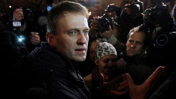 Alexei Navalny pictured speaking to journalists in Moscow on December 21, 2011.