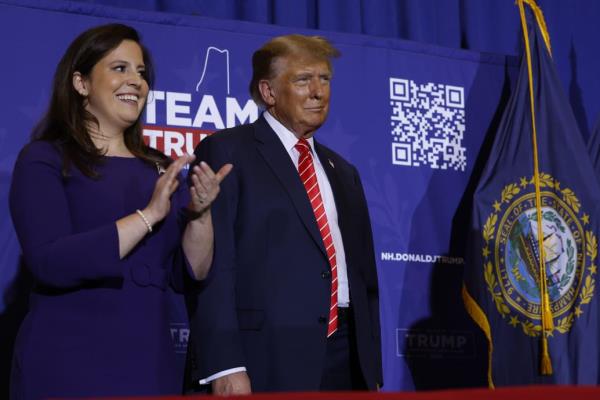 Rep. Elise Stefanik (R-NY) with Do<em></em>nald Trump during a campaign rally in January in Concord, New Hampshire.