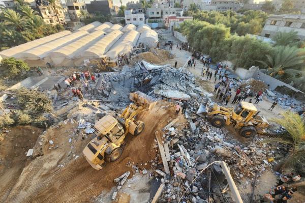 Rubble is seen in the wake of Israeli airstrikes in Deir el-Balah, Gaza.