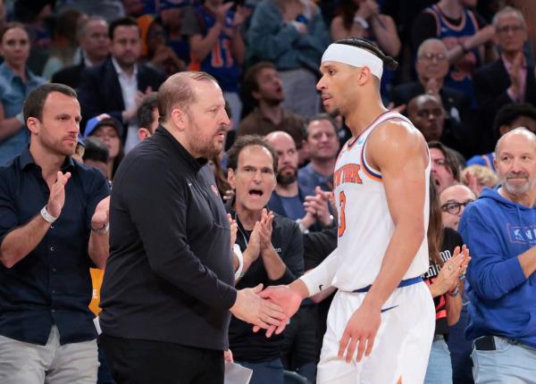 Knicks coach Tom Thibodeau greets Josh Hart as he walks back to the bench after a standing ovation from fans on May 19, 2024.