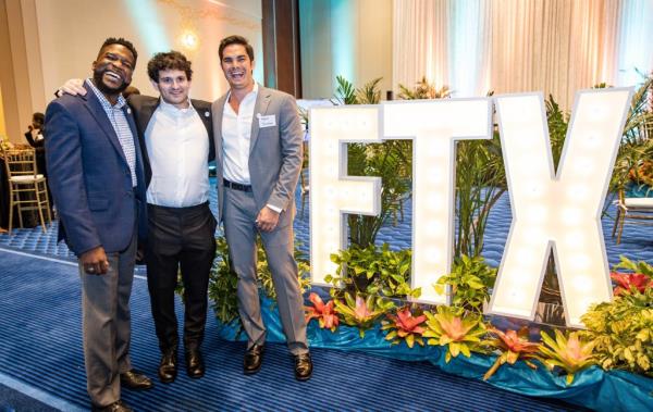 Ryan Salame pictured far right with Bankman-Fried and an unidentified individual