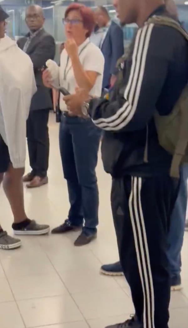 A screengrab showing the female staffer.