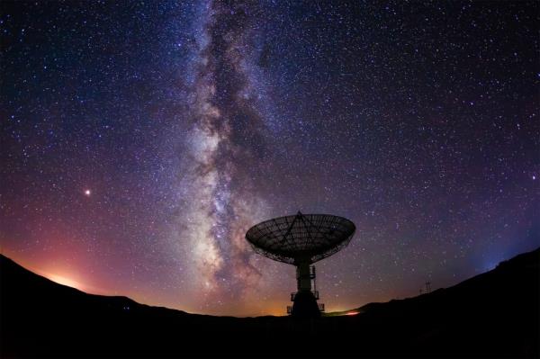 Astro<em></em>nomers have discovered an eight billion-year-old radio signal