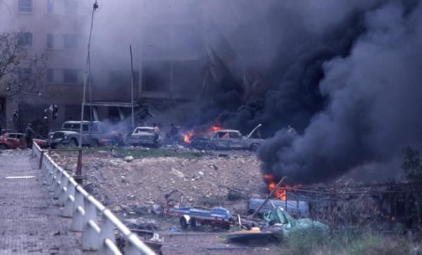 View of the destruction and damage at the scene of the suicide bombing of the American Embassy
