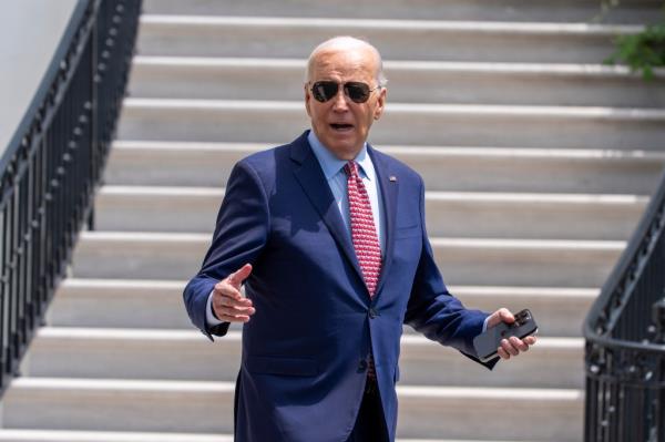 President Joe Biden reacts to a reporter's question as he walks to Marine One for departure from the South Lawn of the White House, Wednesday, May 29, 2024, in Washington.